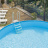 Piscina, lettini prendisole